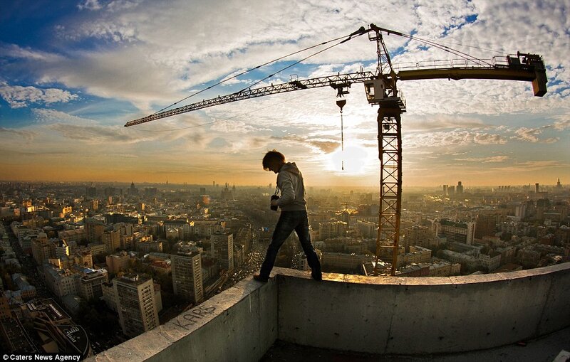 Person on Rooftop Edge