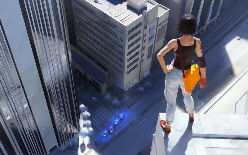 person on rooftop overlooking city