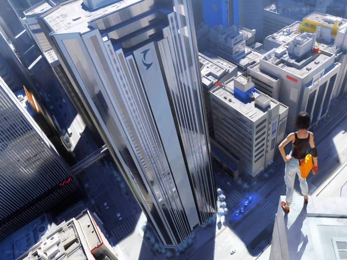 person on rooftop overlooking city