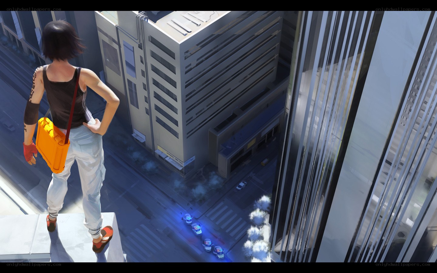 person on rooftop overlooking city