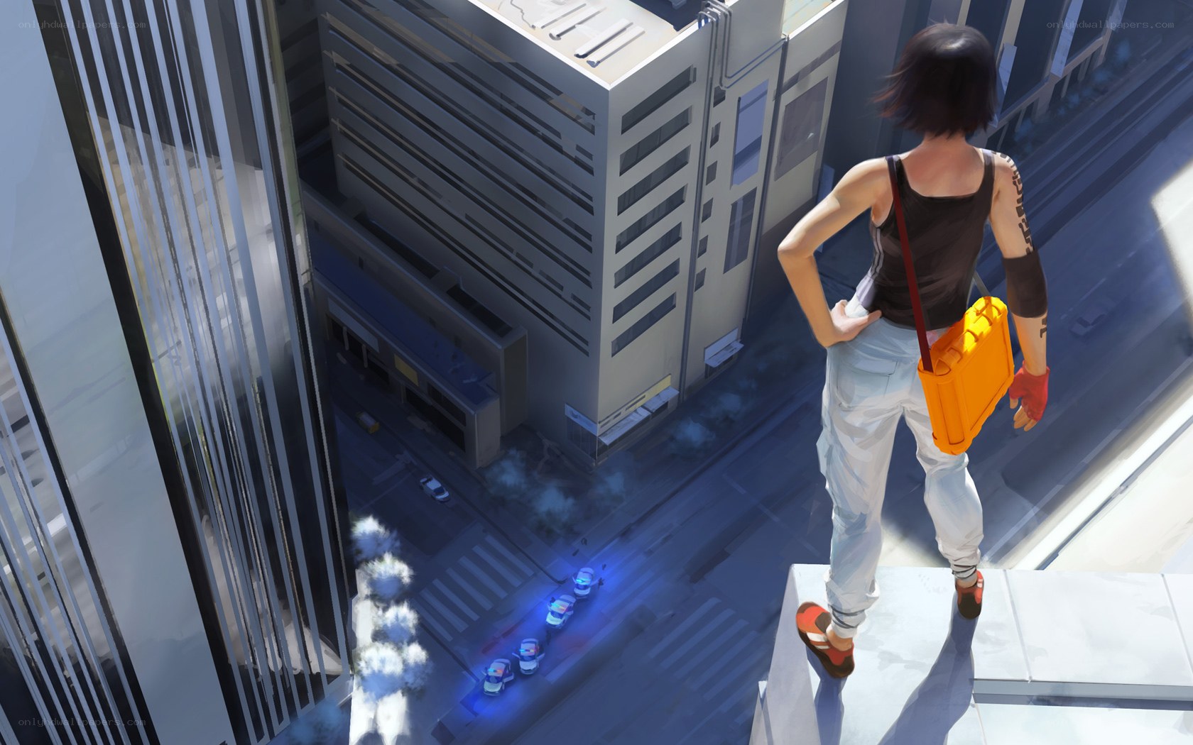 person on rooftop overlooking city