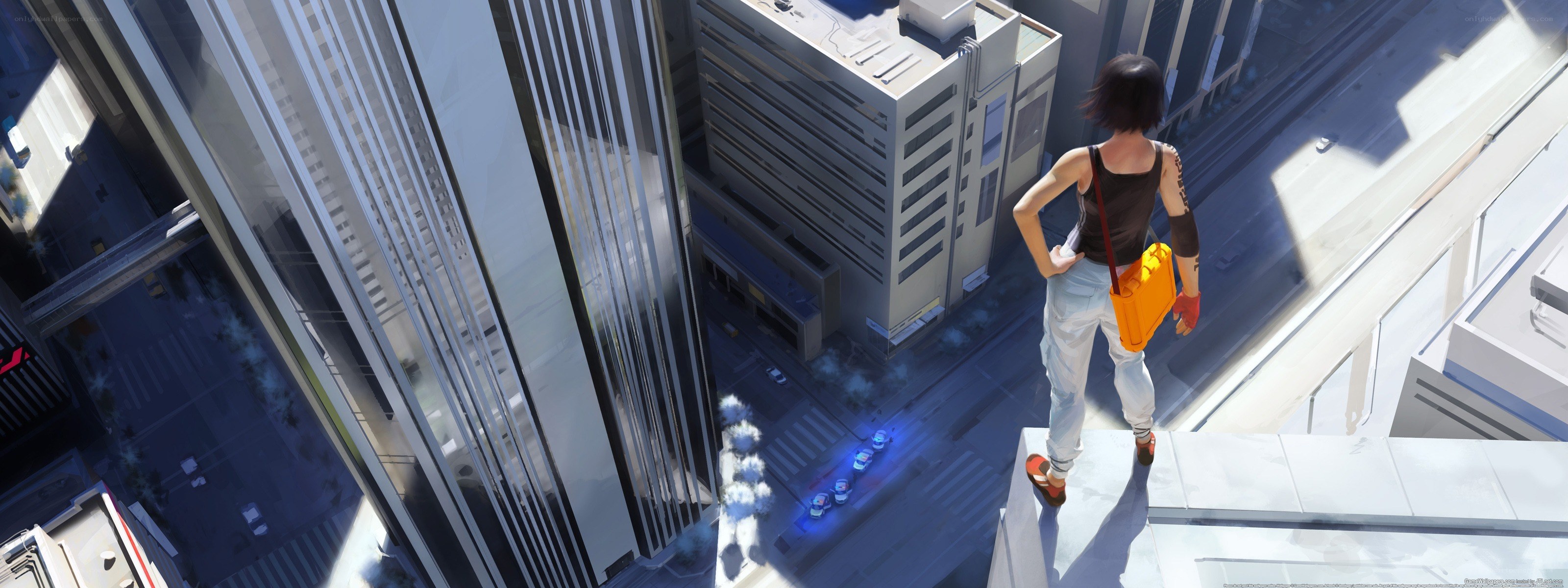 person on rooftop overlooking city