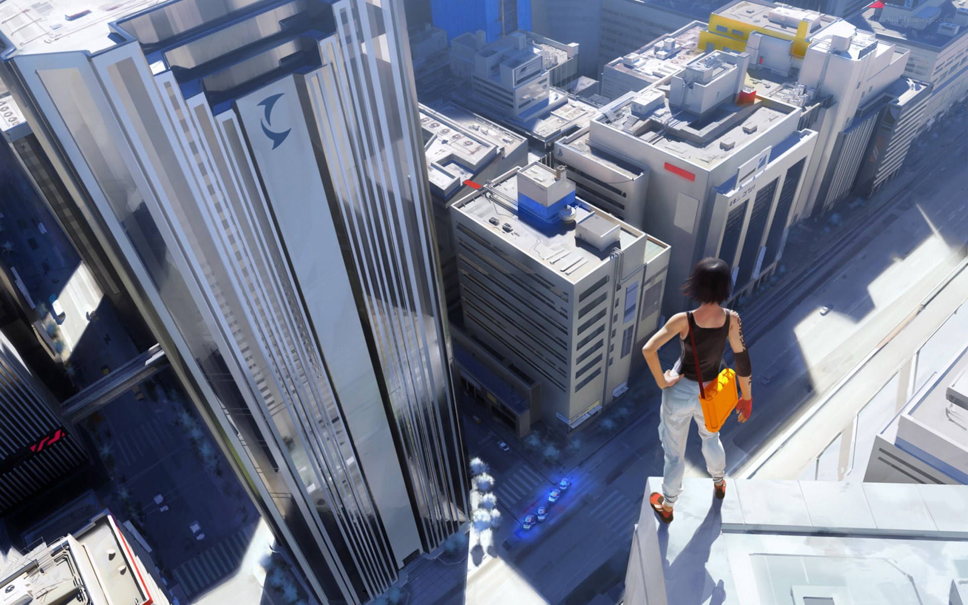 person on rooftop overlooking city