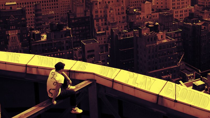 person on rooftop with text