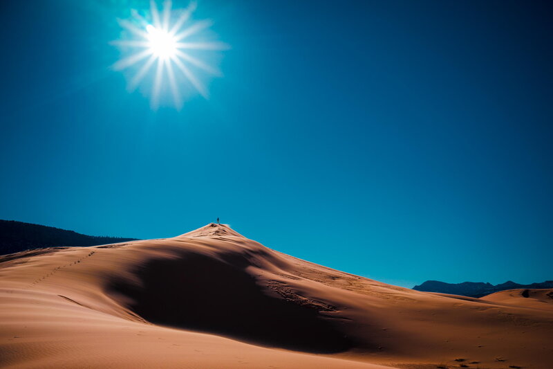 Person on Sand Dune — Blue