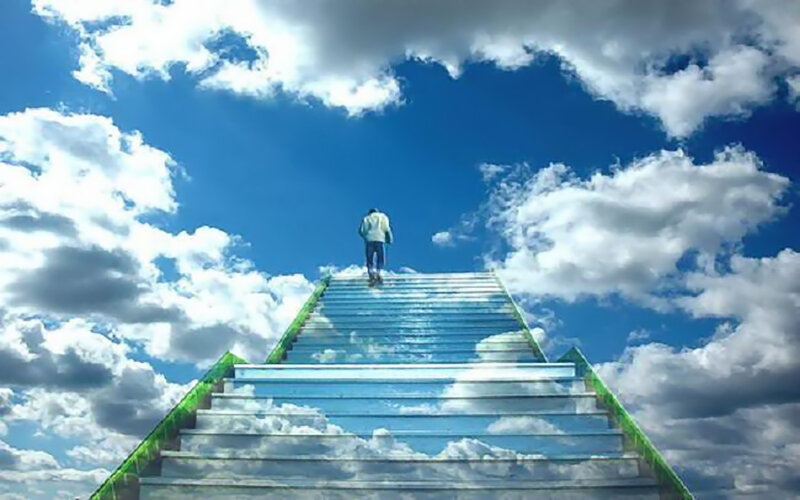 Person on Sky Stairs
