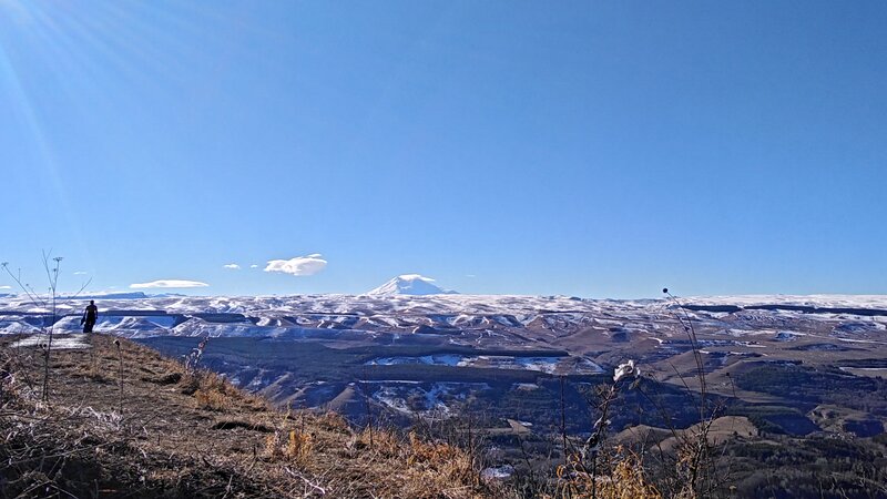 Person on Snowy Mountain — Blue