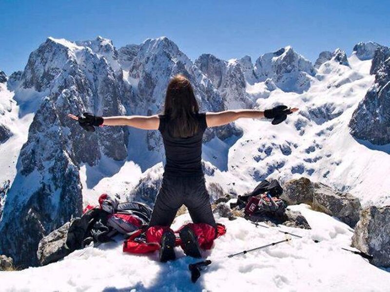Person on Snowy Mountain — White