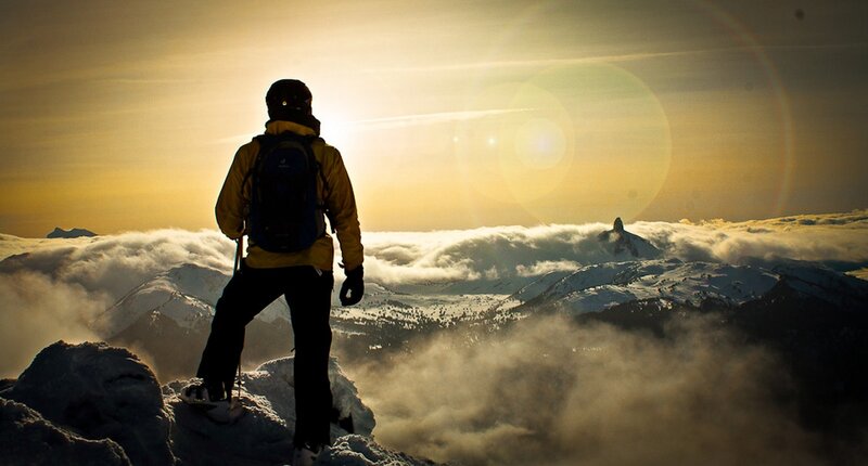 Person on Snowy Mountain — Yellow