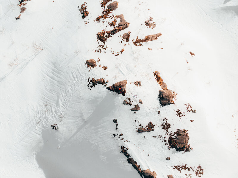 Person on Snowy Slope — White