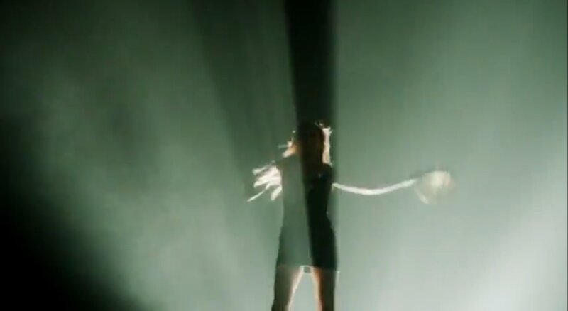 Person on Stage with Lights
