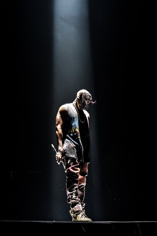 Person on Stage with Microphone — Black, Dramatic