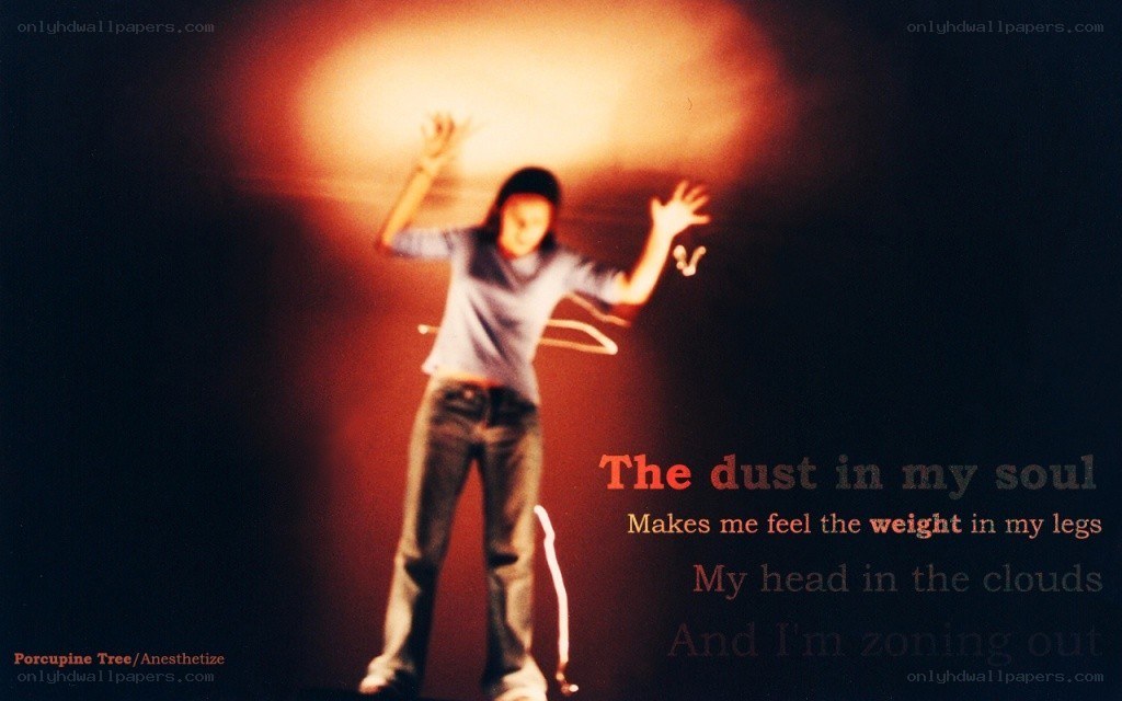 person on stage with text