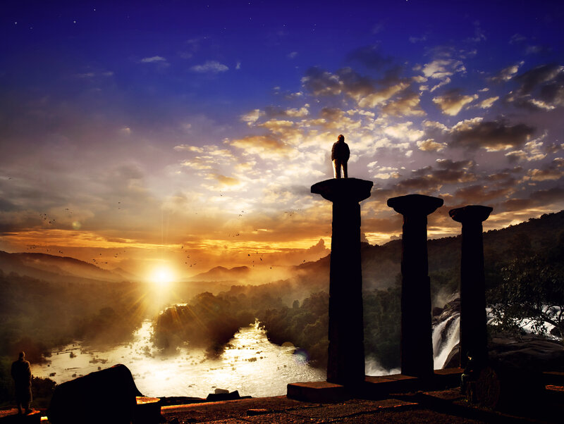 Person on Stone Pillar