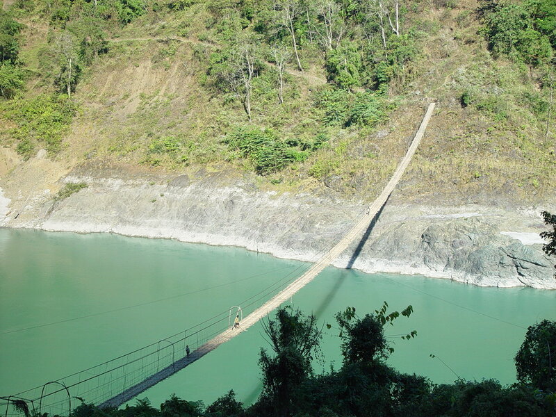 Person on Suspension Bridge