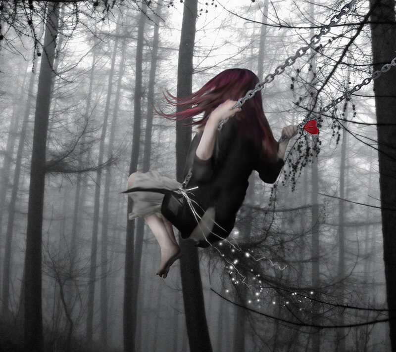 Person on Swing in Forest