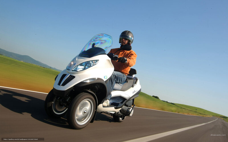 Person on Three-wheeled Scooter