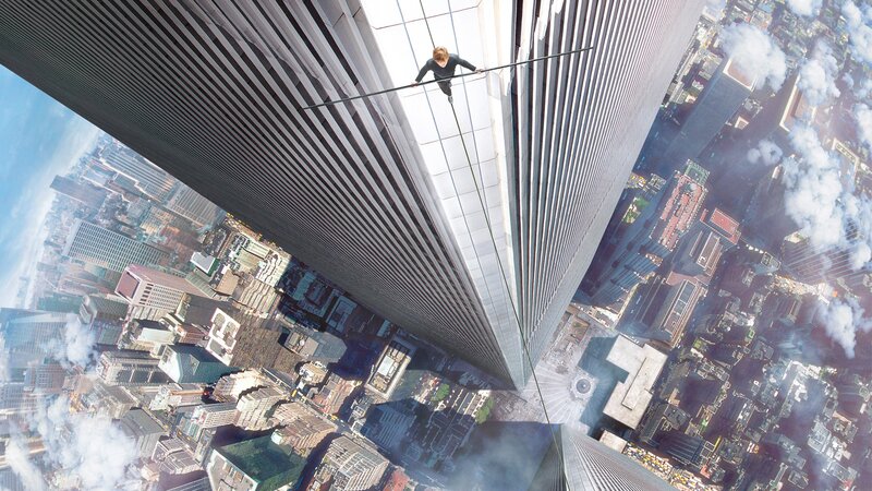Person on Tightrope Between Towers