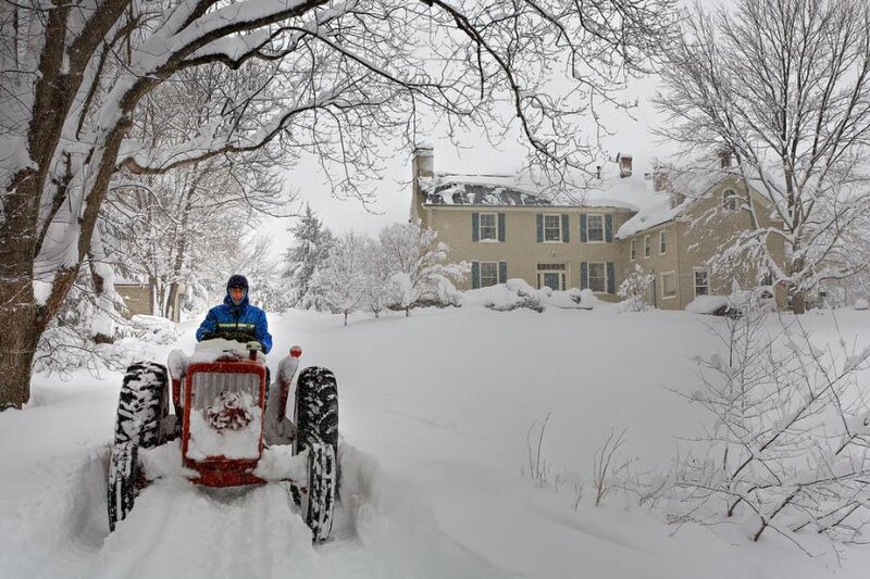 Person on Tractor in Snow