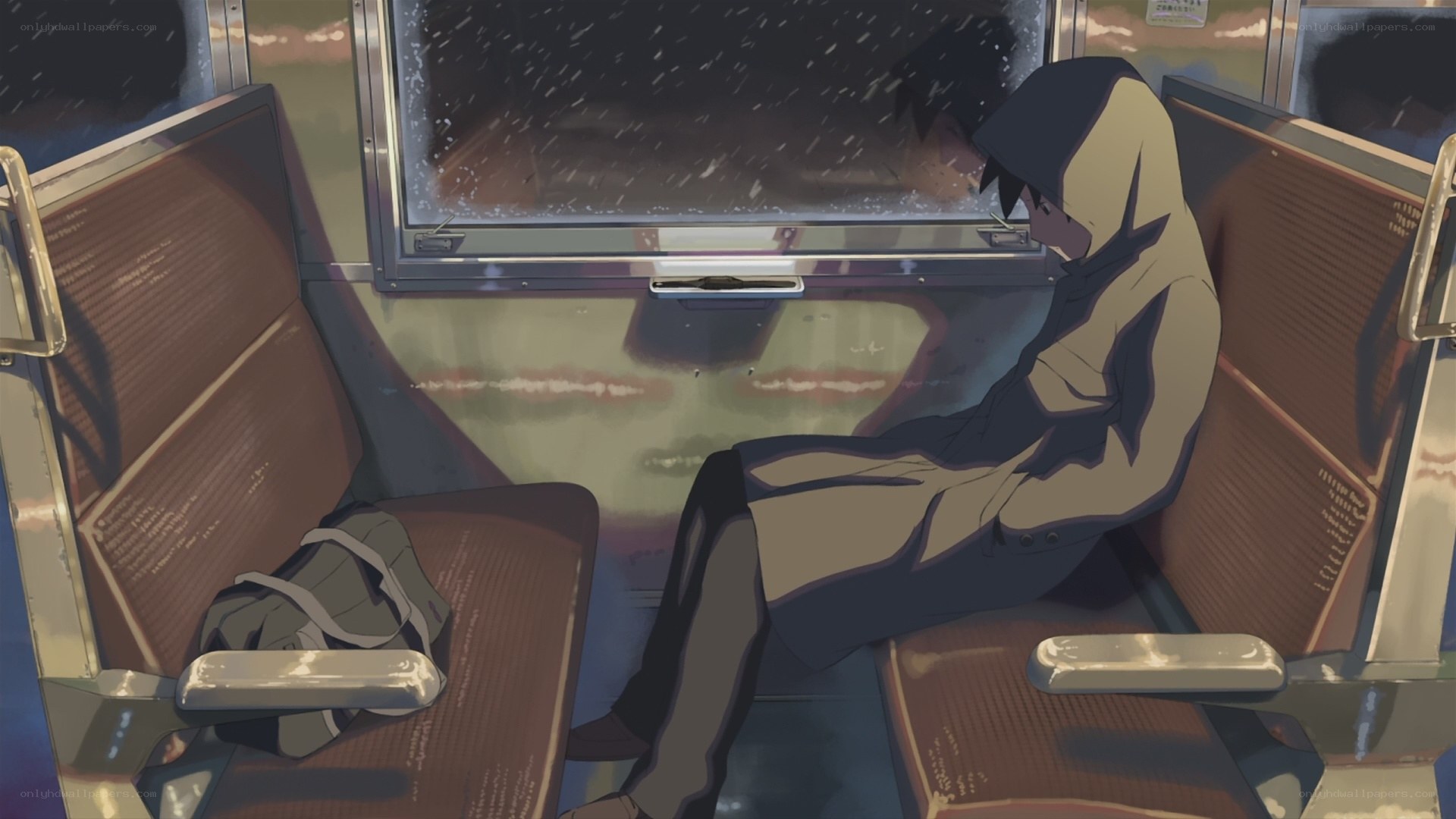 person on train in rain
