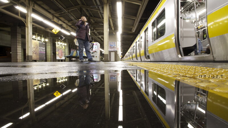 Person on Train Platform — Yellow