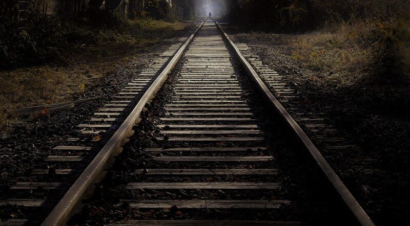 Person on Train Tracks — Black, Dramatic