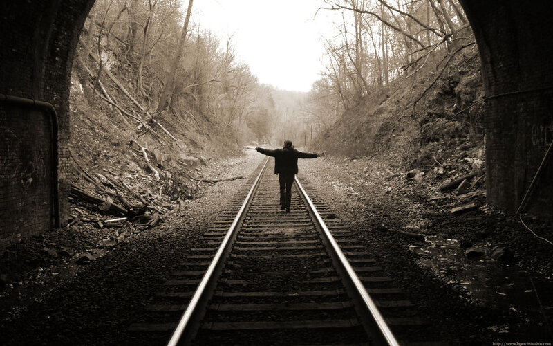 Person on train tracks