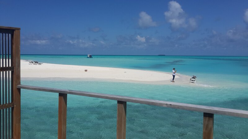 Person on Tropical Beach — Blue, Serene, Afternoon, Photograph, Sandbar