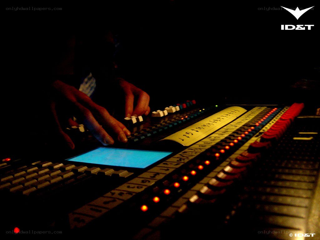 Person operating sound mixing console