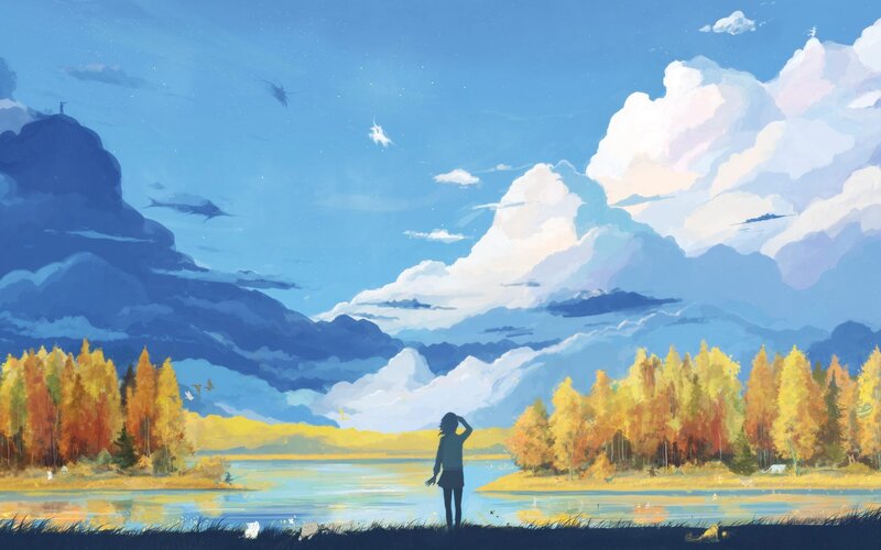 Person overlooking autumn lake