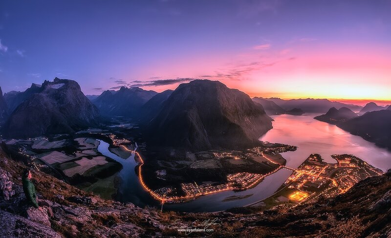 Person Overlooking Fjord