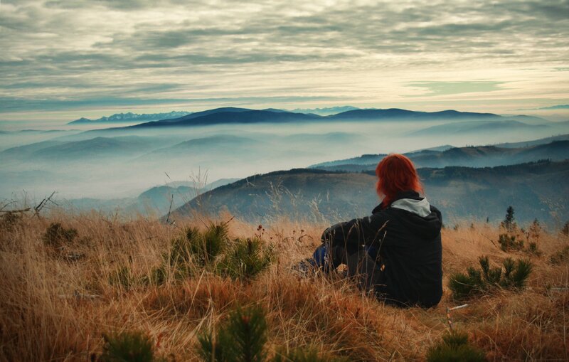 Person overlooking mountain valley