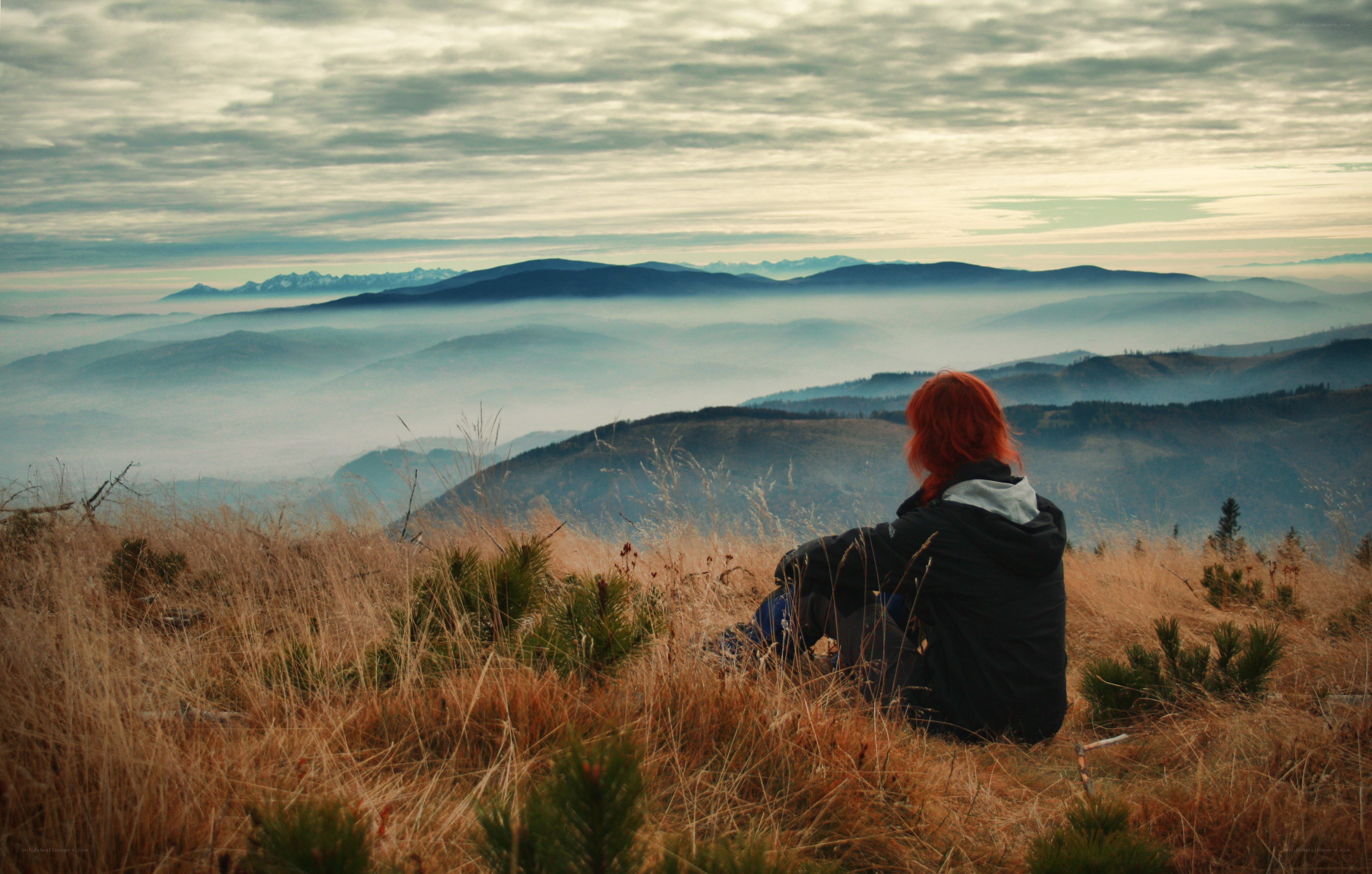 Person overlooking mountain valley