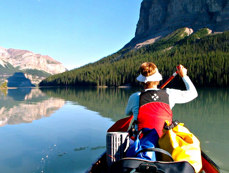 Person Paddling Canoe