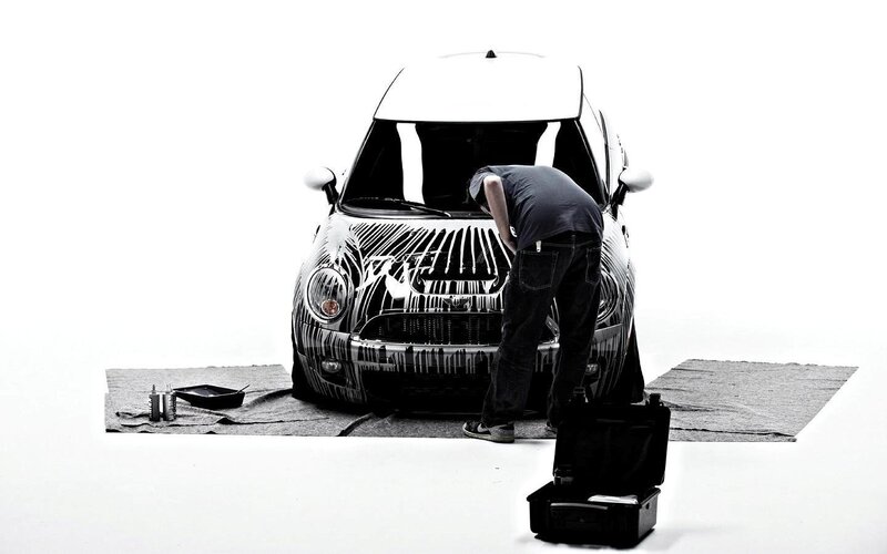 Person Painting Car
