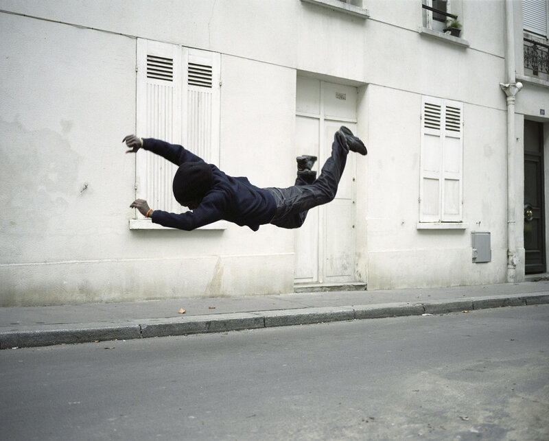 Person performing acrobatic jump