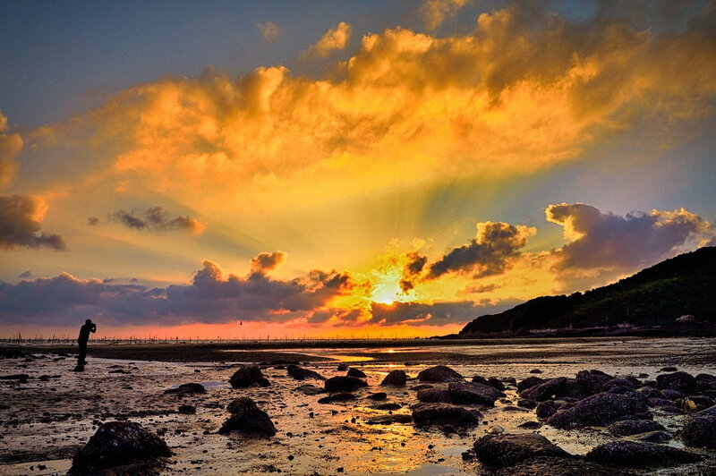 Person Photographing Sunset — Orange