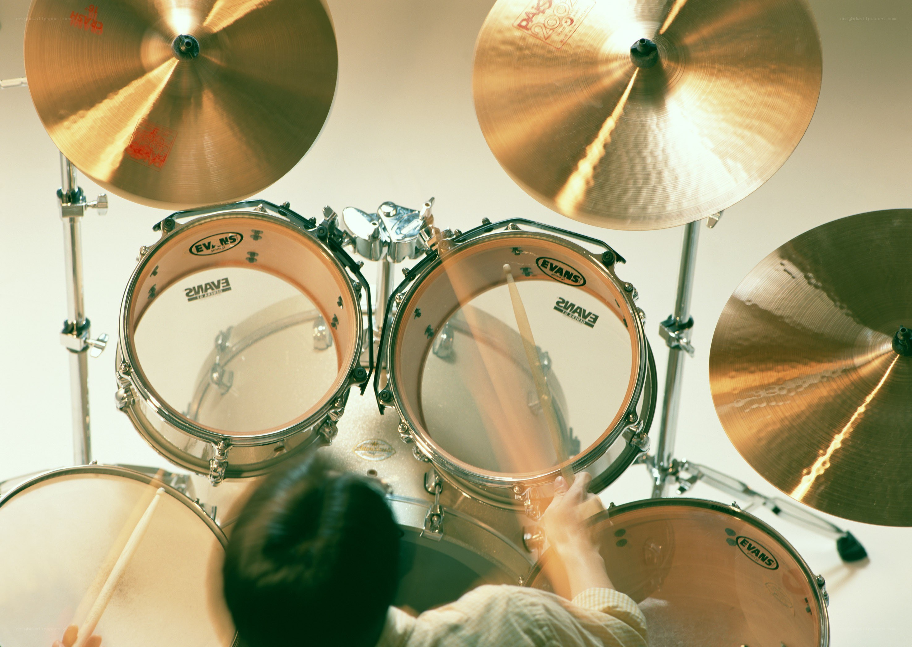 Person playing a drum set