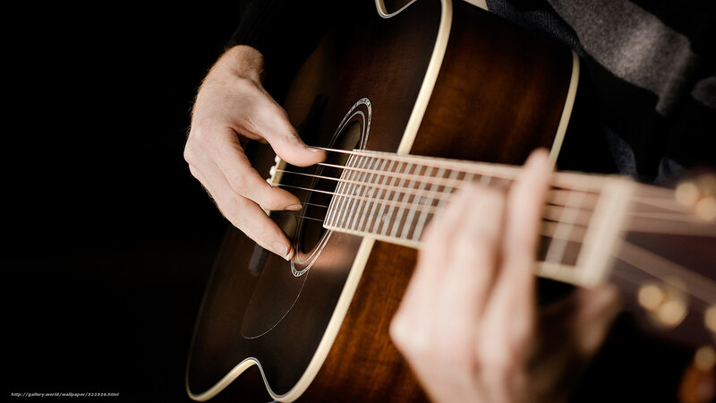Person Playing Acoustic Guitar — Brown, Focused