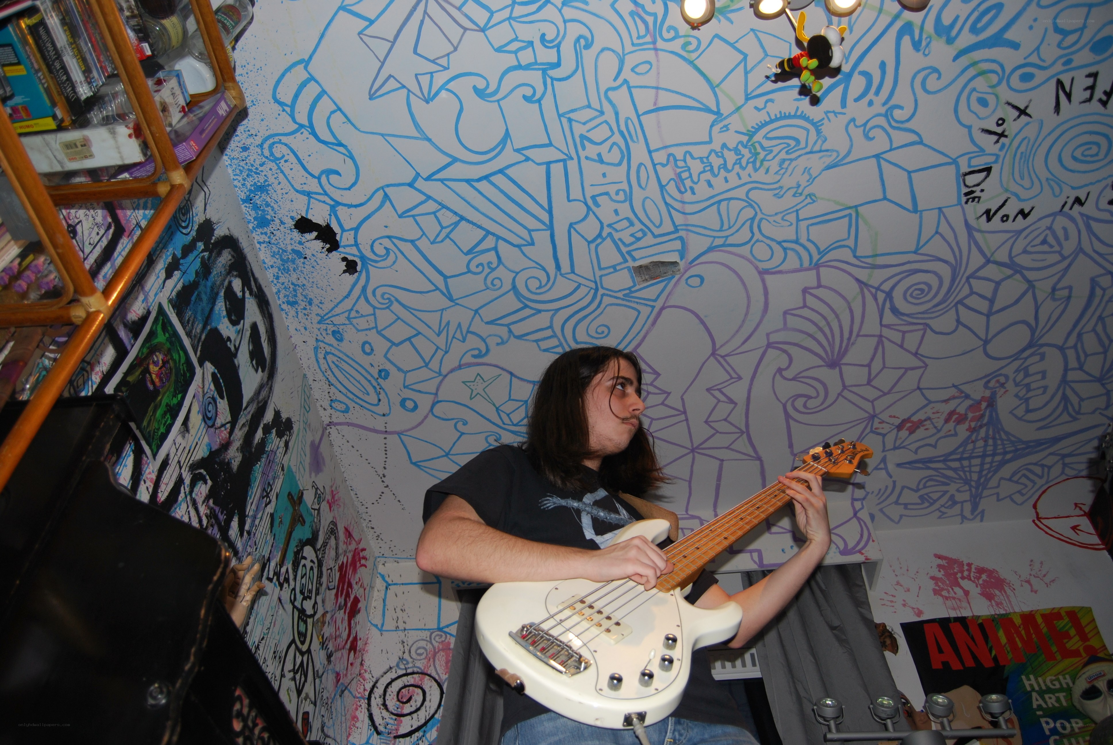 person playing bass guitar