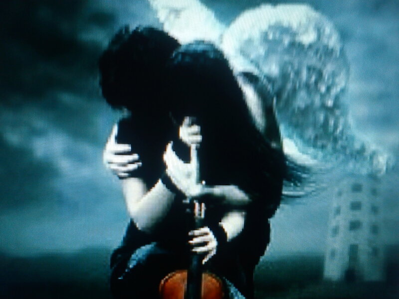 Person Playing Cello — Blue