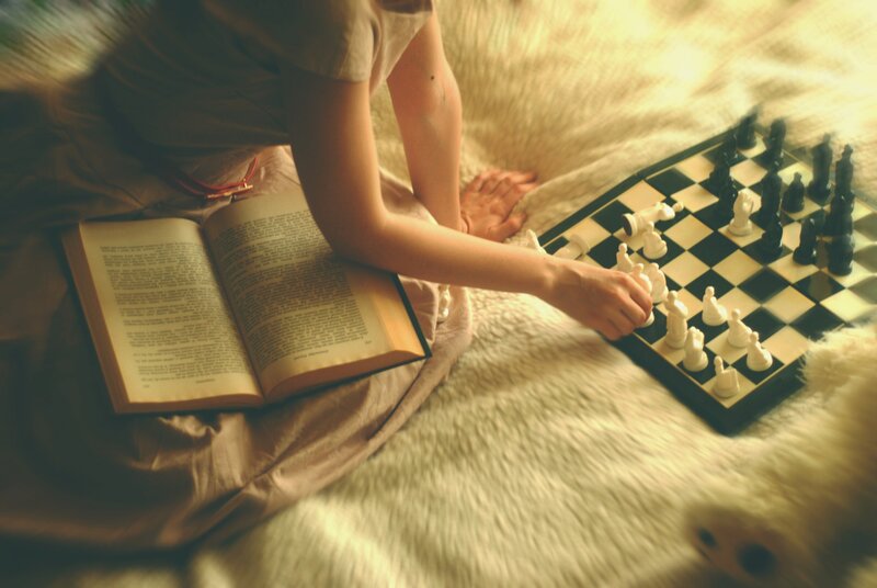 Person Playing Chess