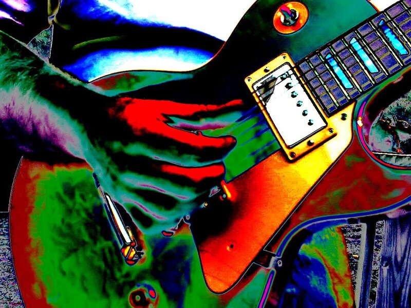 Person Playing Electric Guitar — Red, Vibrant