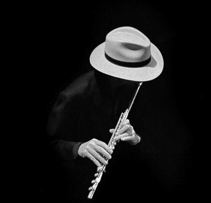 Person Playing Flute