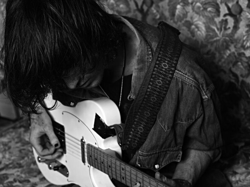Person Playing Guitar — Black, Intense