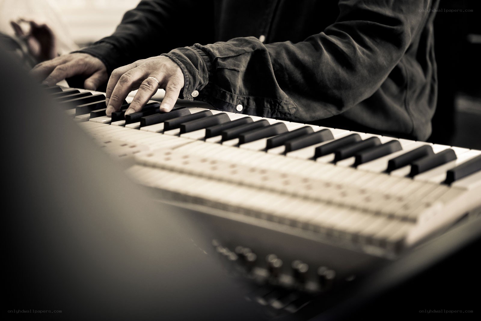person playing keyboard instrument
