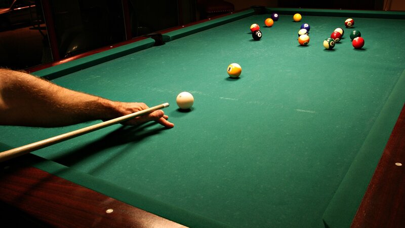 person playing pool game