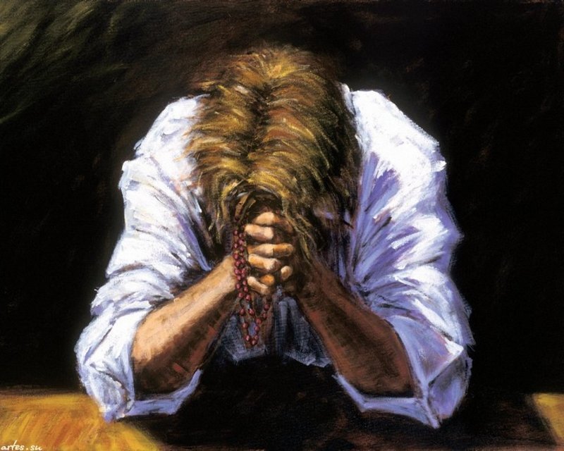 Person Praying with Rosary