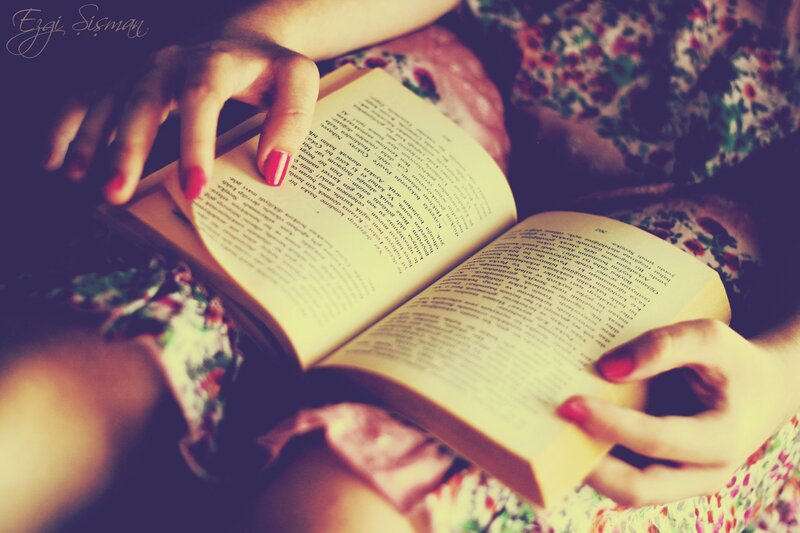 Person Reading a Book — Yellow