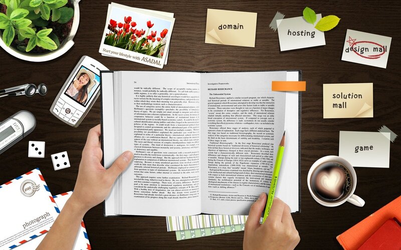person reading book at desk